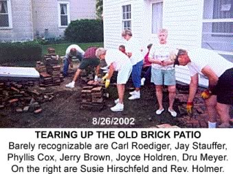 Tearing up the old brick patio